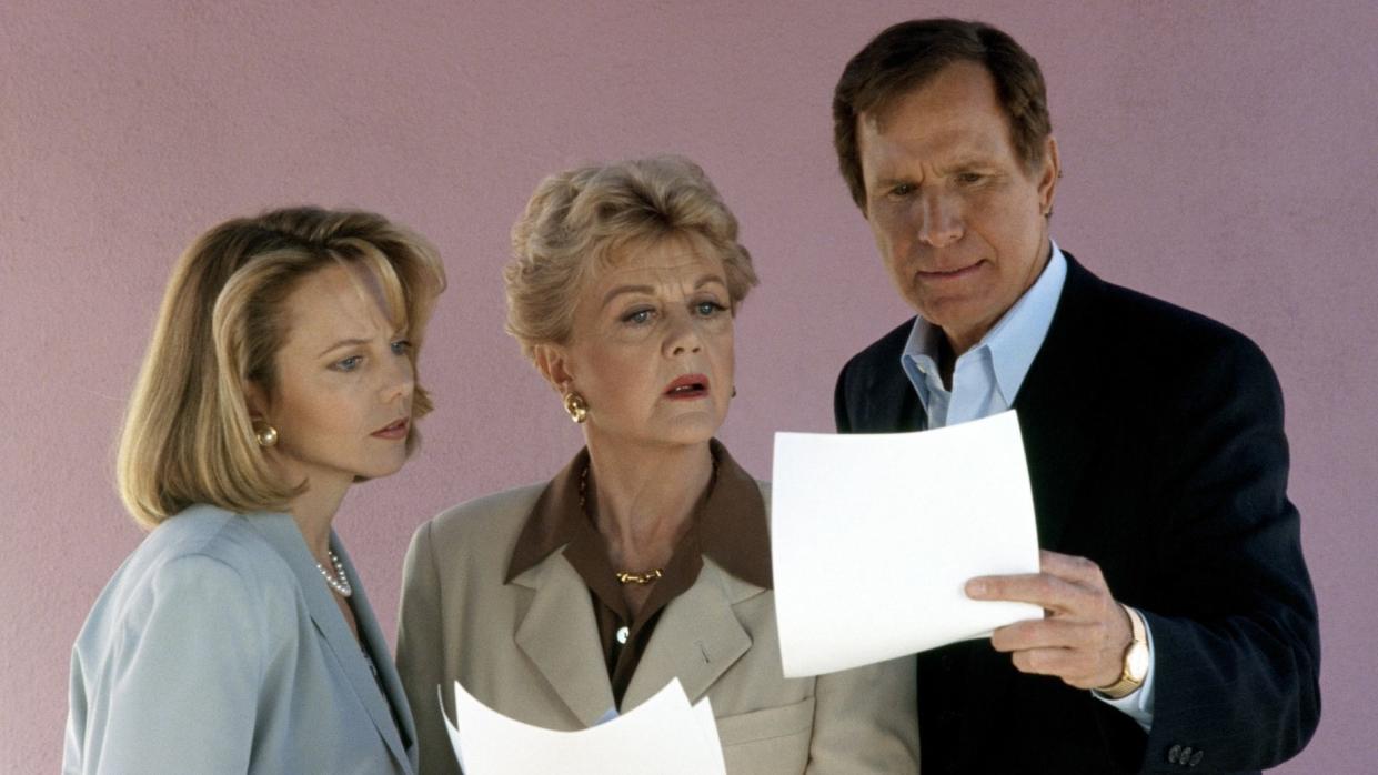 (Pictured left to right) Linda Purl (as Laura Callanstar), Angela Lansbury (as mystery writer Jessica Fletcher) and Wayne Rogers (as Charlie Garrett) star in an episode of the CBS television detective drama "Murder, She Wrote" titled "Dead Eye." The episode originally aired February 7, 1993. 