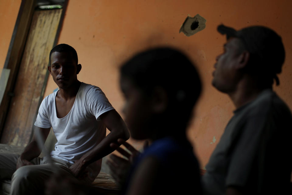 Raymond Acosta, a friend of the family of Maroly Bastardo, talks with Reuters at his house in Guiria, Venezuela, on May 24. (Photo: Ivan Alvarado/Reuters)