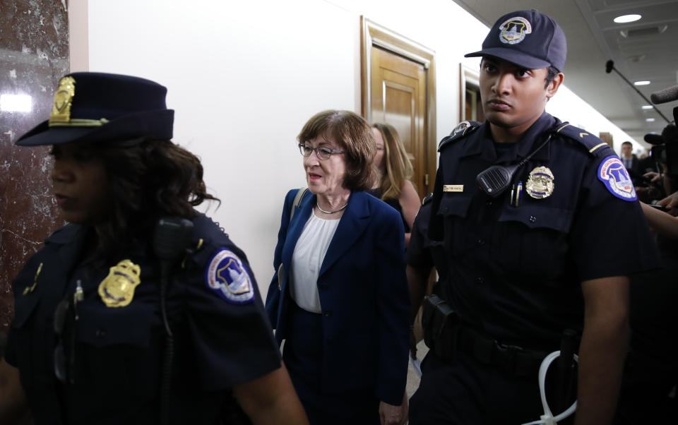 Sen. Susan Collins, R-Maine, departs a hearing on Capitol Hill, Wednesday, Oct. 3, 2018 in Washington. (AP Photo/Alex Brandon)