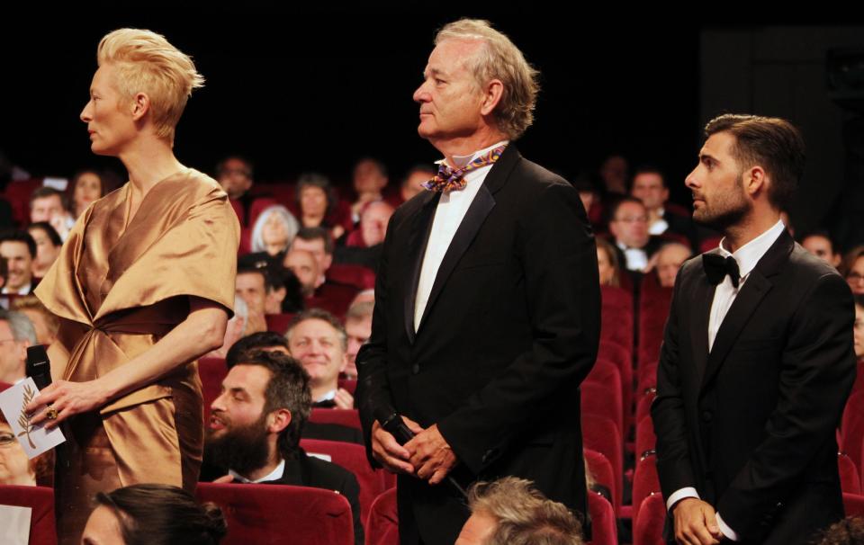 From left, actors Tilda Swinton, Bill Murray and Jason Schwartzman attend the opening ceremony at the 65th international film festival, in Cannes, southern France, Wednesday, May 16, 2012. (AP Photo/Joel Ryan)