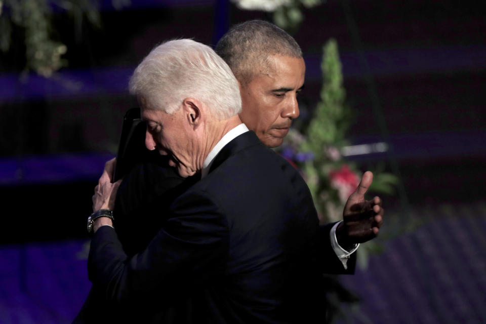 Former presidents Barack Obama, left, and Bill Clinton hug at the end of funeral services for Rep. Elijah Cummings, Friday, Oct. 25, 2019, in Baltimore. The Maryland congressman and civil rights champion died Thursday, Oct. 17, at age 68 of complications from long-standing health issues. (AP Photo/Julio Cortez, Pool)