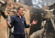 California Governor Gavin Newsom speaks at a press conference while touring areas damaged by the Glass Fire at Foothills Elementary School near St. Helena, Calif., Thursday, Oct. 1, 2020. (Christopher Chung/The Press Democrat via AP, Pool)