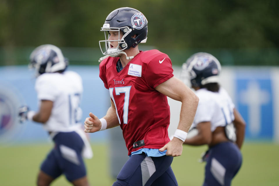 Tennessee Titans quarterback Ryan Tannehill (17) runs to a drill during NFL football training camp Friday, Aug. 28, 2020, in Nashville, Tenn. (AP Photo/Mark Humphrey, Pool)