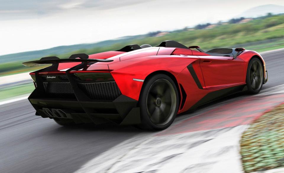 Starting with the everyday 700-hp Aventador, Lamborghini taunted the bull even further by removing the roof, adding several aerodynamic panels and generally shucking weight from a car that only had 3,472 lbs. to begin with. Even the seat fabrics have been swapped for something Lamborghini calls "Carbonskin," a fabric made from carbon fibers that's at least a decade away from being used on a teenager's hat. With no windshield, the interior has to get some form of waterproofing; the rear mirror pops up like Wall-E's head from the center of the dash. It and the roll bars behind the driver are the highest points in the car.