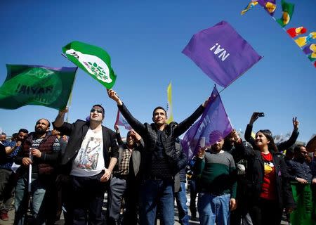 Pro-Kurdish opposition Peoples' Democratic Party (HDP) and "Hayir" ("No") supporters attend a campaign for the upcoming referendum in Istanbul, Turkey April 13, 2017. REUTERS/Osman Orsal