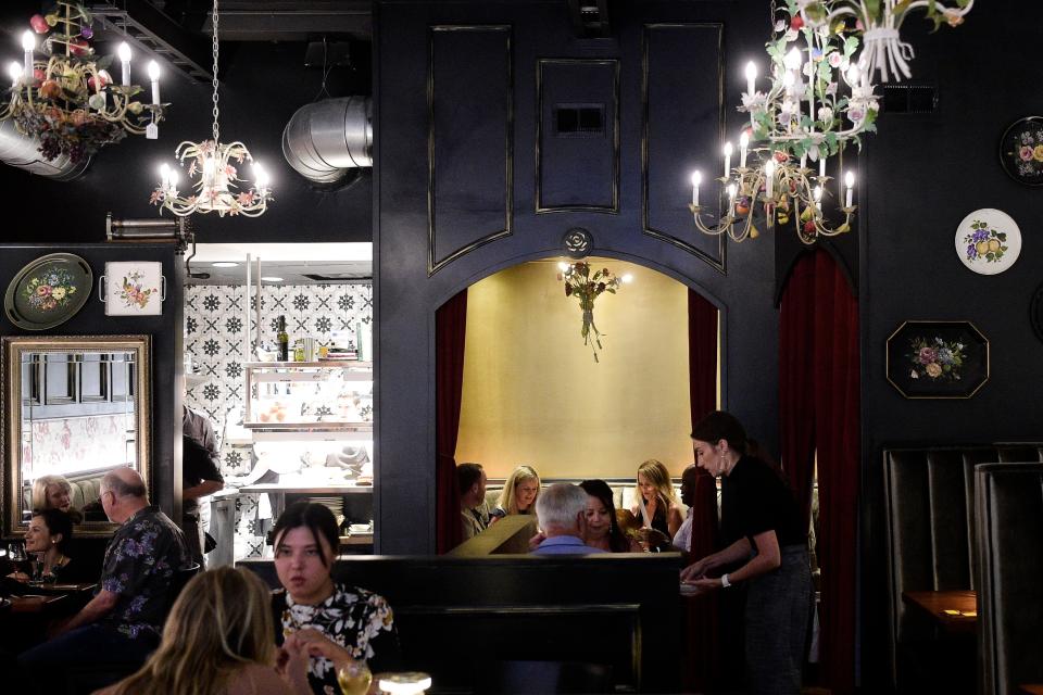 Patrons dine inside the newly-opened Osteria Stella restaurant on 108 W. Jackson Ave. in the Old City in Knoxville, Tenn. on Friday, July 9, 2021. A formal opening is planned for mid July.