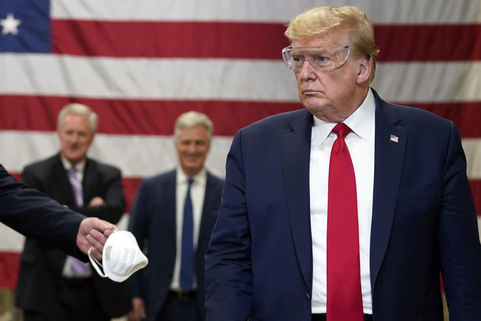 President Donald Trump participates in a tour of a Honeywell International plant that manufactures personal protective equipment on May 5, 2020, in Phoenix.  (Photo: AP Photo/Evan Vucci)