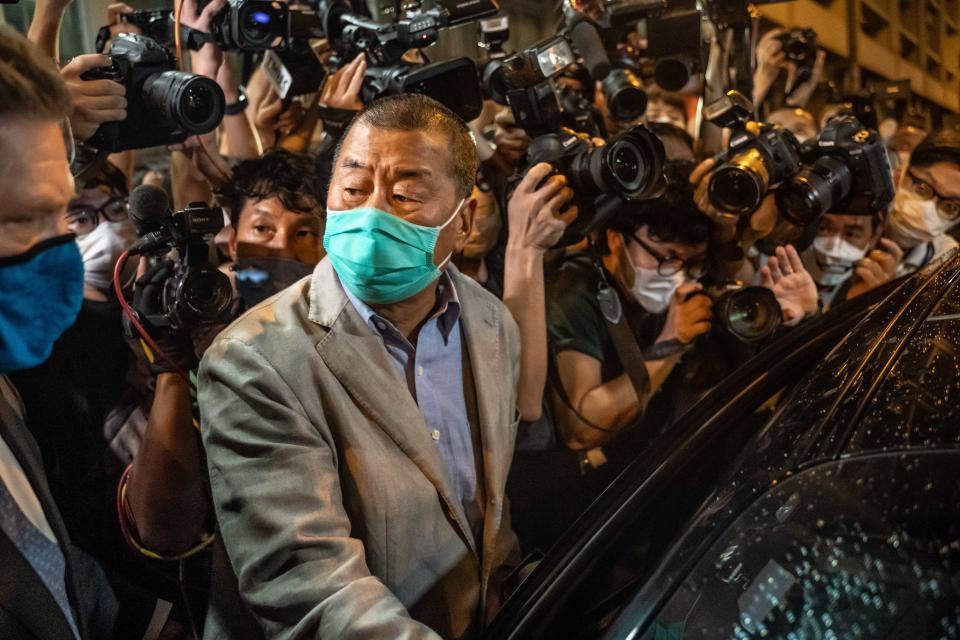 HONG KONG, CHINA - AUGUST 12: Hong Kong pro-democracy media tycoon and Apple Daily founder Jimmy Lai, who was arrested on Monday under the new national security law, leaves Mong Kok police station after being released on bail on August 12, 2020 in Hong Kong, China. According to local police, Lai was arrested on suspicion of “colluding with foreign powers.” (Photo by Anthony Kwan/Getty Images)