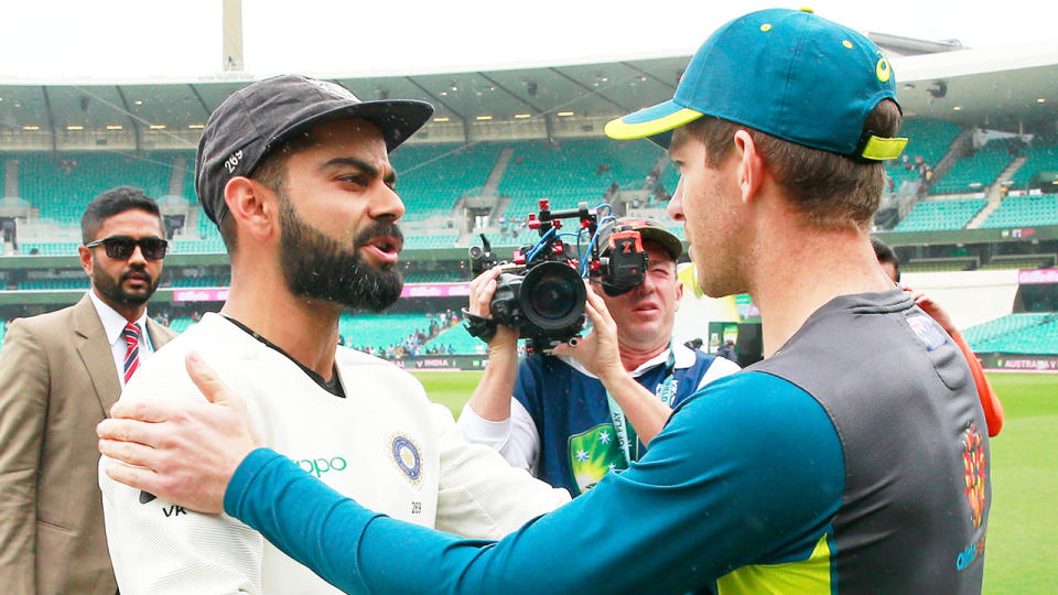 Indian captain Viart Kohli (pictured left) shakes hands with Australian captain Tim Paine (pictured right) at the SCG. (Getty Images)