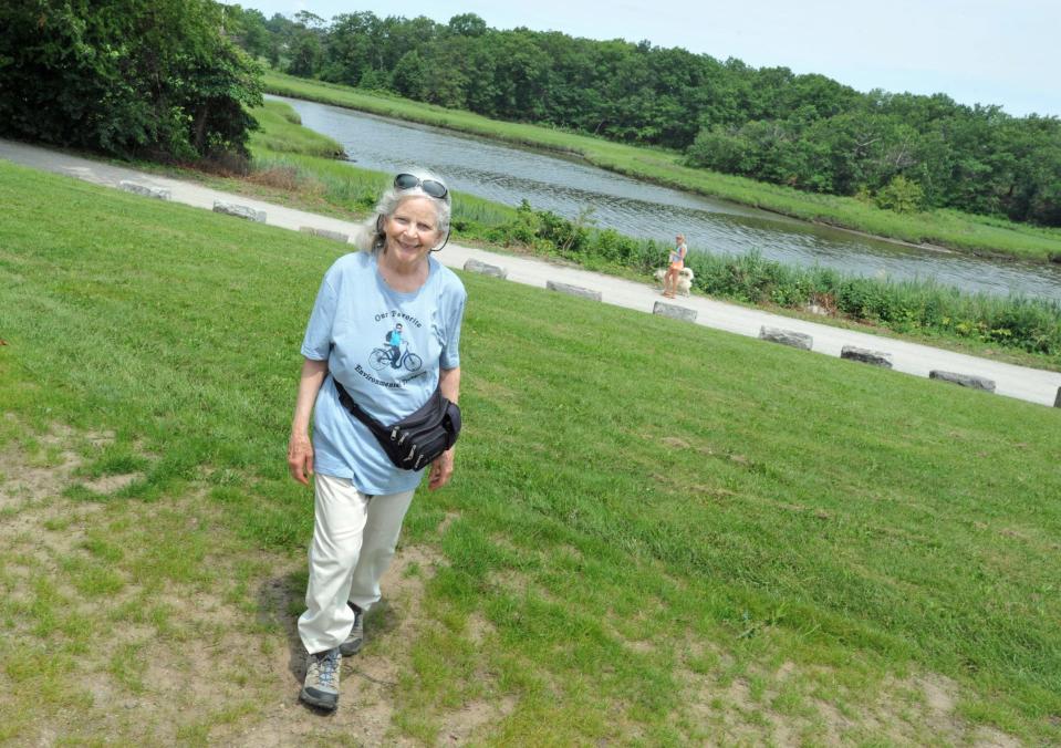 Quincy Environmental Treasures Program founder Sally Owen of Quincy walks near Blacks Creek in Merrymount Park in Quincy, Sunday, July 9, 2023. Tom Gorman/For The Patriot Ledger