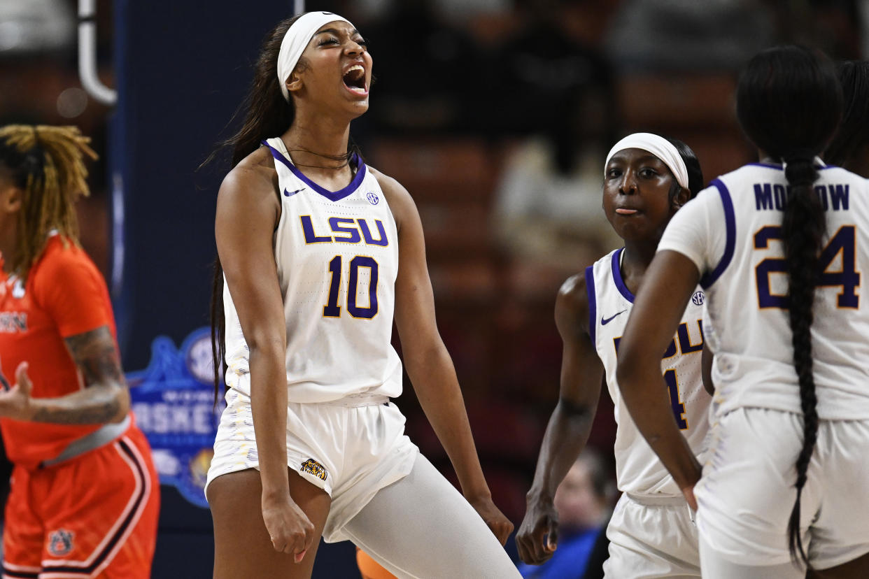 GREENVILLE, SOUTH CAROLINA - MARCH 08: Angel Reese #10 of the LSU Lady Tigers celebrates against the Auburn Tigers in the first quarter during the quarterfinals of the SEC Women's Basketball Tournament at Bon Secours Wellness Arena on March 08, 2024 in Greenville, South Carolina. (Photo by Eakin Howard/Getty Images)