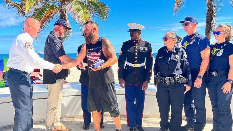 Noah Coughlan ran from Washington to Florida in 167 days as a tribute to veterans. Fort Lauderdale city officials welcomed him with a police escort as he completed the final leg of his journey, carrying an American flag to the Atlantic Ocean.