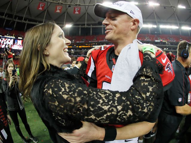 <p>Kevin C. Cox/Getty</p> Matt Ryan and Sarah Marshall after defeating the Green Bay Packers in the NFC Championship Game