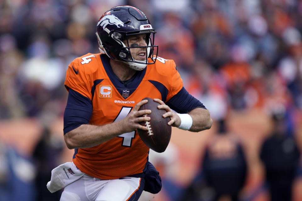 Denver Broncos quarterback Case Keenum looks to throw a pass during the first half of an NFL football game against the Los Angeles Chargers, Sunday, Dec. 30, 2018, in Denver. (AP Photo/Jack Dempsey)