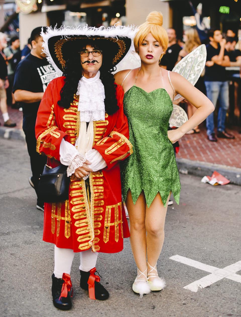 Captain Hook and Tinker Bell from Peter Pan cosplayers 