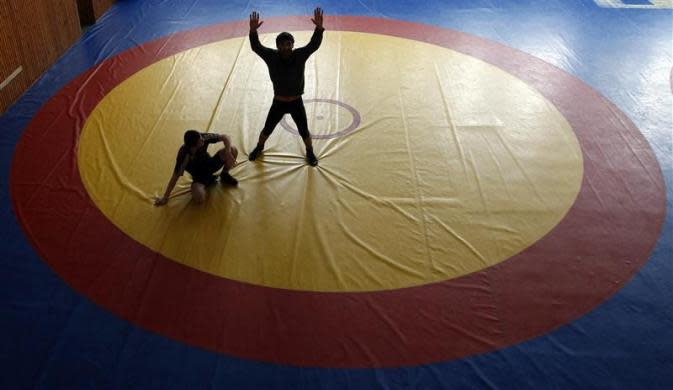 Freestyle wrestlers take part in a training session at a sport base in Makhachkala, the capital of Russia's North Caucasus republic of Dagestan, March 23, 2012.