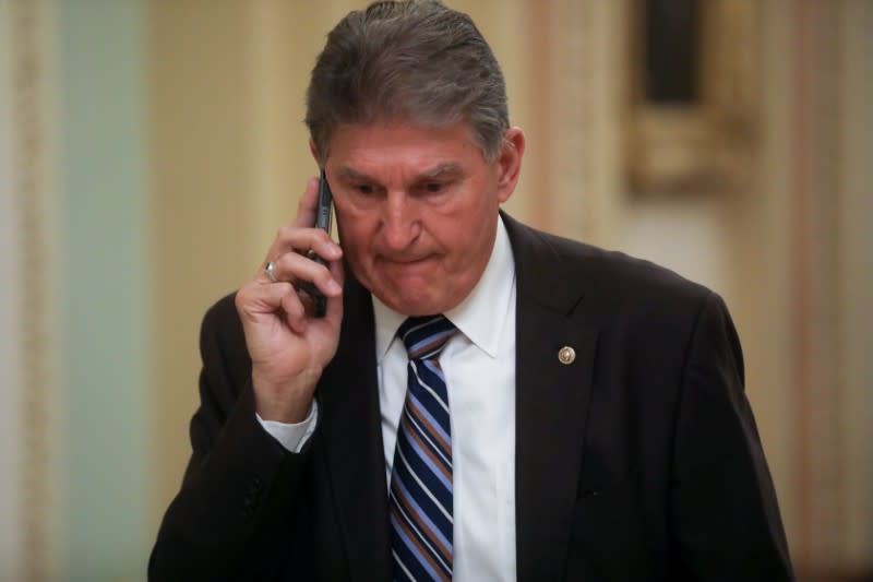 U.S. Senator Manchin walks near the Senate floor at the U.S. Capitol in Washington