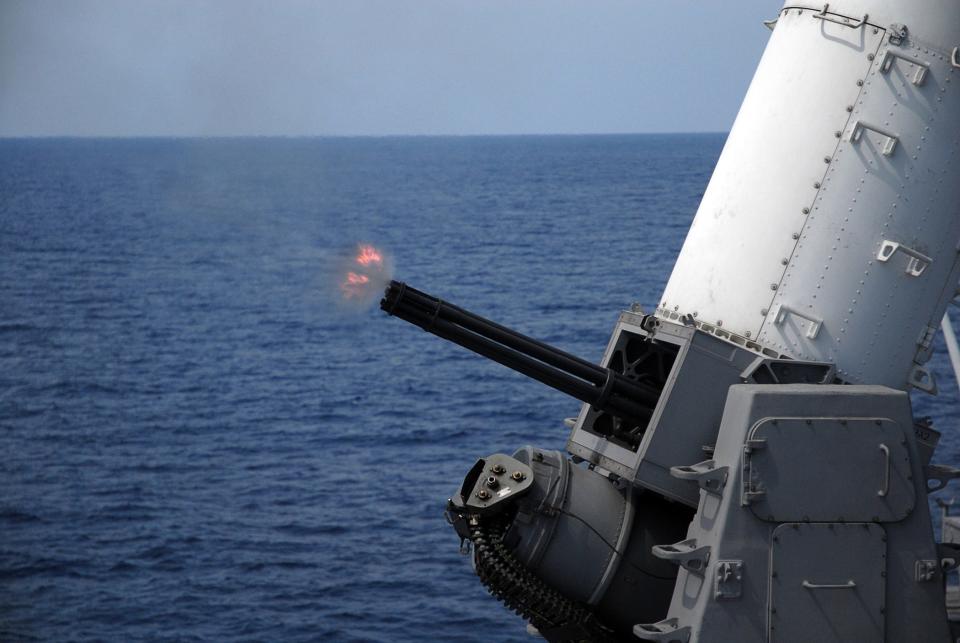 Austin-class amphibious transport dock USS Juneau (LPD 10) test fires one of its Phalanx Close-In Weapon System (CIWS) mounts.