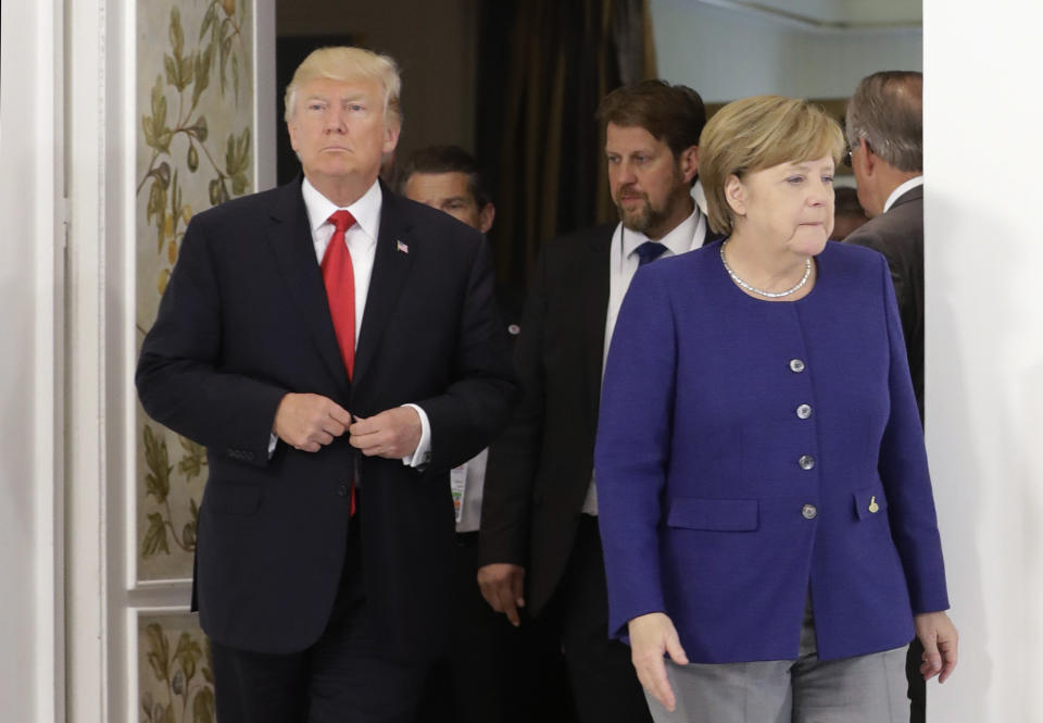 German Chancellor Angela Merkel and U.S. President Donald Trump arrive for a bilateral meeting on the eve of the G-20 summit in Hamburg, Germany, on July 6, 2017.