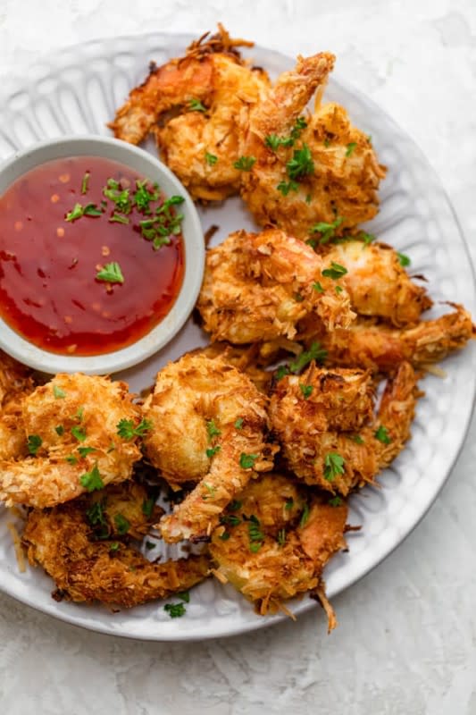 <p>Feel Good Foodie</p><p>This air fryer coconut shrimp recipe is like your favorite restaurant-style version, but only healthier because I skip the heavy oil and deep frying method.</p><p><strong>Get the recipe: <a href="https://feelgoodfoodie.net/recipe/air-fryer-shrimp/" rel="nofollow noopener" target="_blank" data-ylk="slk:Air Fryer Shrimp;elm:context_link;itc:0;sec:content-canvas" class="link ">Air Fryer Shrimp</a></strong></p>