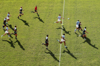 Fast passing interchanges are at the heart of rugby’s appeal, and here Cameron Spencer (Getty Images) captures a classic Argentinian counter attack as Cruz Mallia offloads the ball to Gonzalo Martin Bertranou. Argentina won the match 47 - 17. Cameron went high in the stands late in the game for this shot: “I wanted to go up there as late as possible so the shadows were long and defined - without the light this image would be far less graphic.”