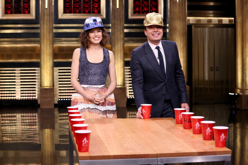 Actress Daisy Ridley and host Jimmy Fallon play Flip Cup on December 3, 2015 -- (Photo by: Douglas Gorenstein/NBC/NBCU Photo Bank via Getty Images)