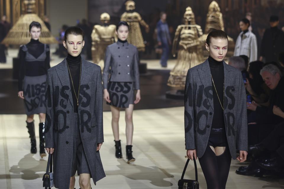 Models wear creations as part of the Christian Dior Fall/Winter 2024-2025 ready-to-wear collection presented Tuesday, Feb. 27, 2024 in Paris. (Photo by Vianney Le Caer/Invision/AP)