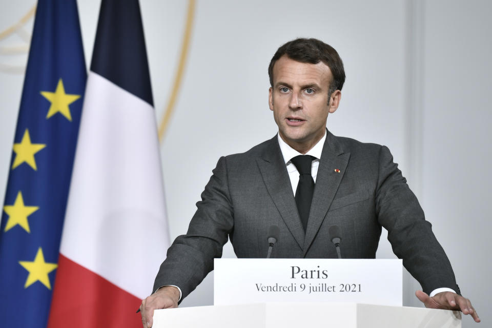 French President Emmanuel Macron delivers his speech during a press conference after a video summit with leaders of G5 Sahel countries at the Elysee presidential Palace in Paris, Friday July 9, 2021. French President Emmanuel Macron said Friday his country will withdraw more than 2,000 troops from an anti-extremism force in Africa's Sahel region starting in the coming months. Macron announced last month a future reduction of France's military presence, arguing that the current operation is no longer adapted to the need. (Stephane de Sakutin, Pool photo via AP)