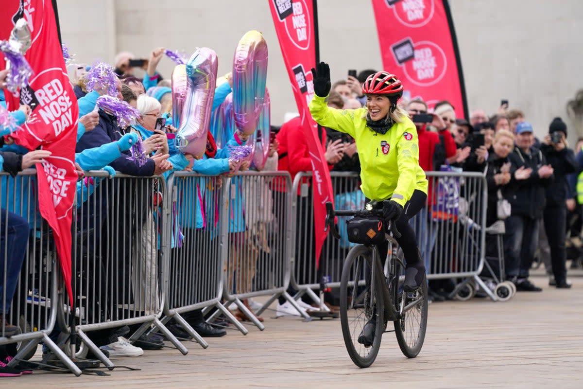 Singer and Radio DJ, Mollie King waving to the crowd as she arrives in Hull (Dominic Lipinski/Getty Images)