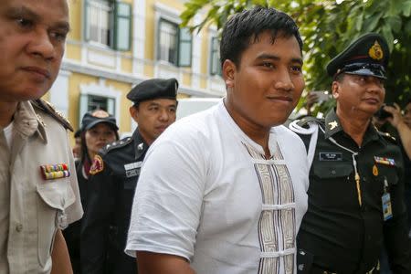 Sirawith Seritiwat, (C), a student leader, arrives at the Thai military court in Bangkok, Thailand, January 21, 2016. REUTERS/Athit Perawongmetha