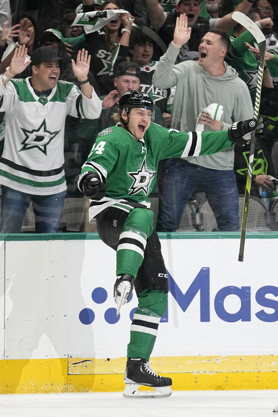 Dallas Stars center Roope Hintz (24) celebrates after scoring against the Minnesota Wild in the first period of Game 2 of an NHL hockey Stanley Cup first-round playoff series, Wednesday, April 19, 2023, in Dallas. (AP Photo/Tony Gutierrez)