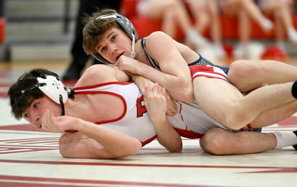 Bald Eagle Area’s Caden Judice controls Bellefonte’s Nolan Weaver in the 121 lb bout of the match on Tuesday, Jan. 23, 2024. Abby Drey/adrey@centredaily.com