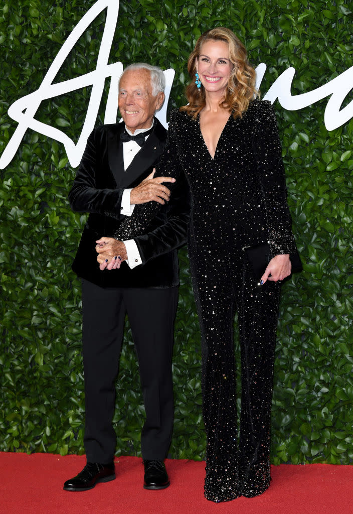 Julia Roberts was joined on the red carpet by Georgio Armani and kept it chic in a classic sparkly jumpsuit [Photo: Getty]