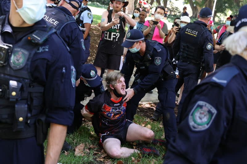 A person is arrested by police during an Australia Day protest in Sydney