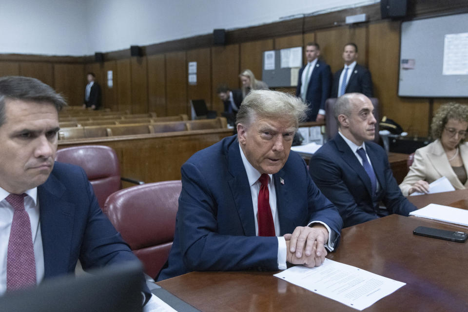 Former U.S. President Donald Trump sits inside a Manhattan criminal court in New York, on Monday, April 15, 2024. The hush money trial of former President Trump begins Monday with jury selection. It's a singular moment for American history as the first criminal trial of a former U.S. commander in chief. (Jeenah Moon/Pool Photo via AP)