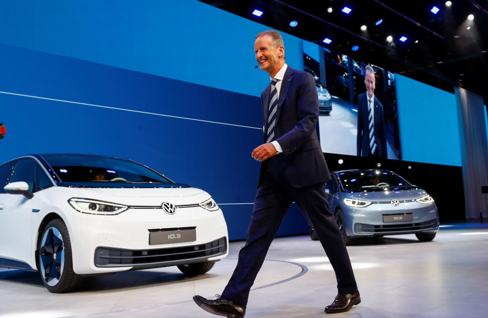 Herbert Diess, CEO of German carmaker Volkswagen AG, walks in front of ID.3 pre-production prototypes during the presentation of Volkswagen's new electric car on the eve of the International Frankfurt Motor Show IAA in Frankfurt, Germany September 9, 2019. REUTERS/Wolfgang Rattay