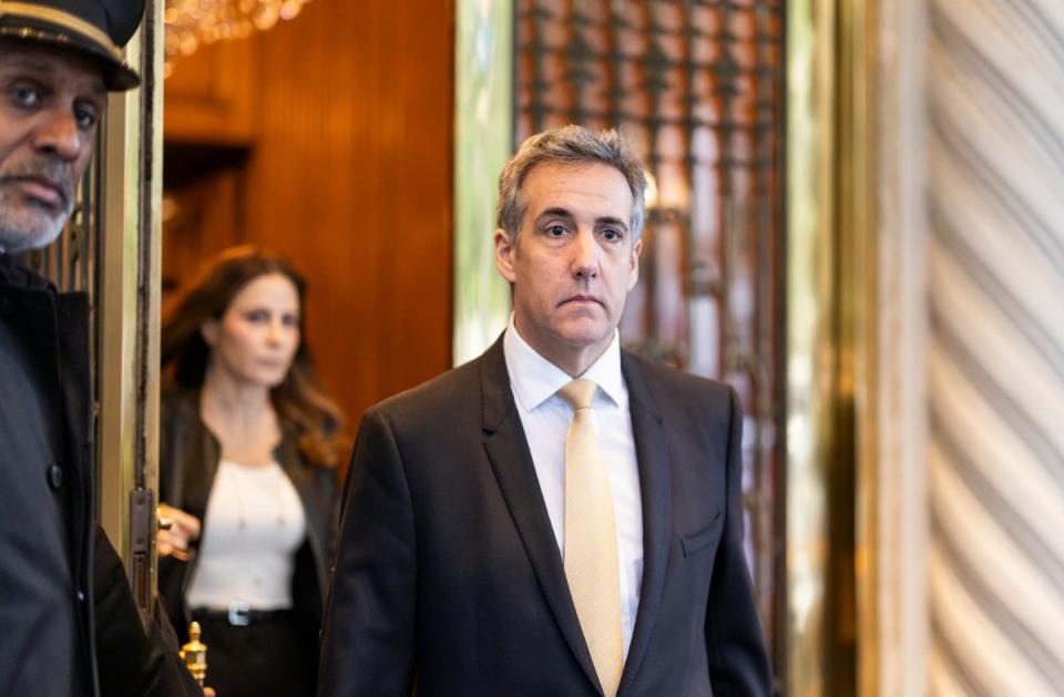 Michael Cohen heads to Manhattan criminal court to take the stand for another day of cross-examination on 16 May (EPA)