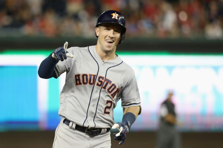 Alex Bregman of the Houston Astros and the American League celebrates as he rounds the bases after hitting a solo home run in the tenth inning against the National League, during the 89th MLB All-Star Game in Washington, DC, on July 17, 2018