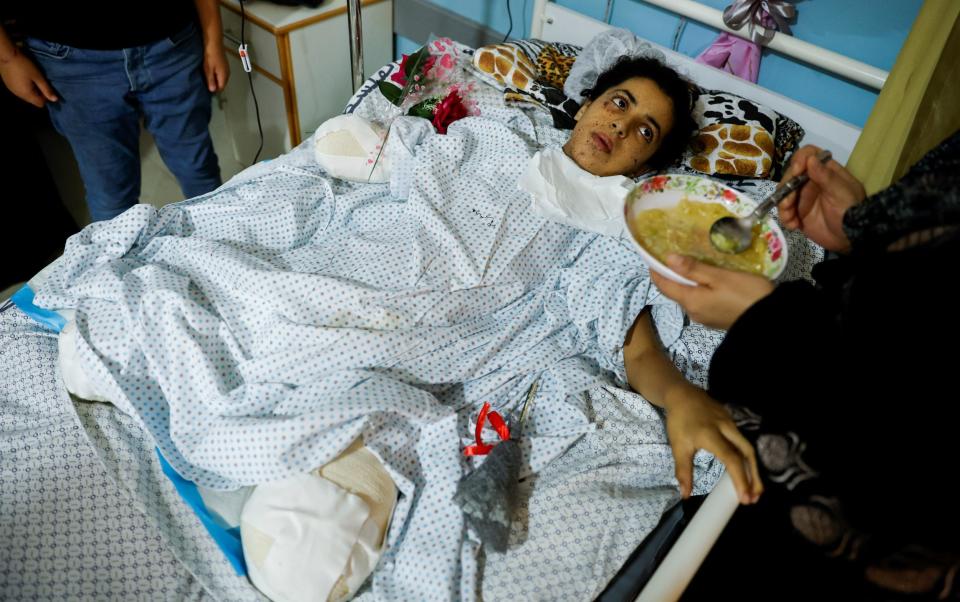 Wounded Palestinian girl Rahaf Salman, 11, who lost her limbs - REUTERS/Mohammed Salem