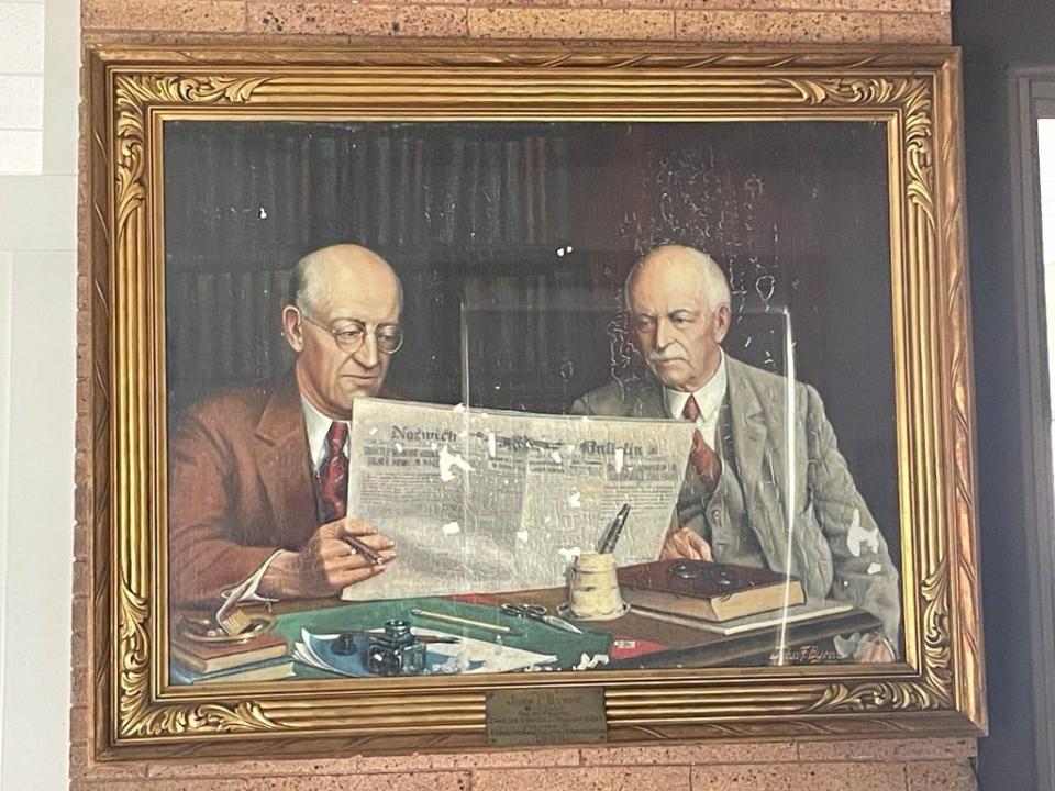 An oil painting of former Norwich Bulletin owners Charles D. Noyes and William H. Oat by John "8-Bells" Byrne, made in 1936.