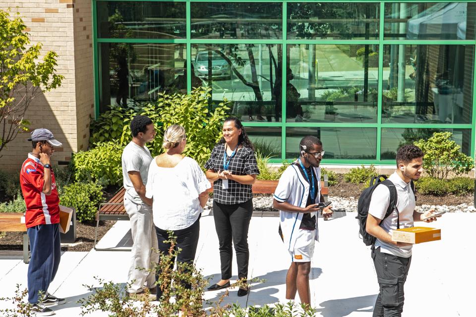 Students line up for hotdogs at the President's Picnic at the Delaware Technical College Wilmington's new courtyard on Wednesday, Sept. 6, 2023. The event marks the completion of DelTech's latest renovations of it's new courtyard and community space.