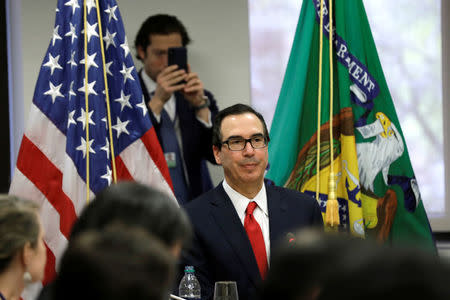 U.S. Treasury Secretary Steve Mnuchin speaks at a news conference during the IMF/World Bank spring meeting in Washington, U.S., April 21, 2018. REUTERS/Yuri Gripas