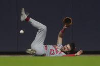 St. Louis Cardinals' Michael Siani can't catch a three-run home run hit by Milwaukee Brewers' Rhys Hoskins during the seventh inning of a baseball game Saturday, May 11, 2024, in Milwaukee. (AP Photo/Morry Gash)
