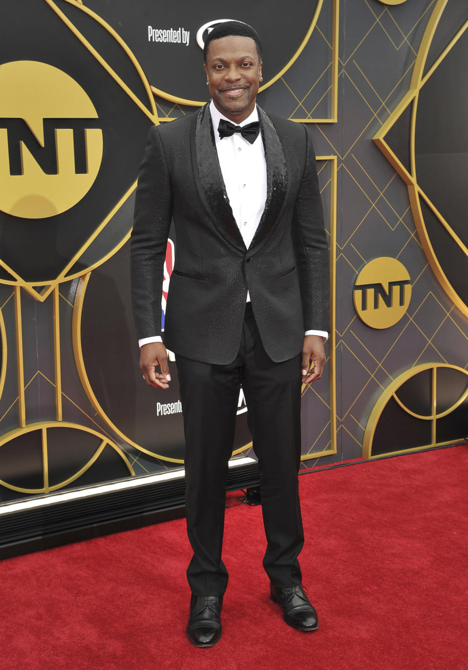 FILE - Chris Tucker arrives at the NBA Awards on June 24, 2019, in Santa Monica, Calif. Tucker turns 49 on Aug. 31. (Photo by Richard Shotwell/Invision/AP, File)