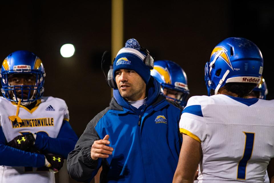 Washingtonville head coach Anthony Finochio talks to players before the start of the game during the Class A semifinal playoff game at Faller Field in Middletown, NY on Friday, November 5, 2021. KELLY MARSH/FOR THE TIMES HERALD-RECORD