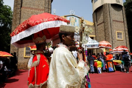 Ethiopian Christian Orthodox clergy attend the funeral of Amhara president Mekonnen and two other officials in the town of Bahir Dar