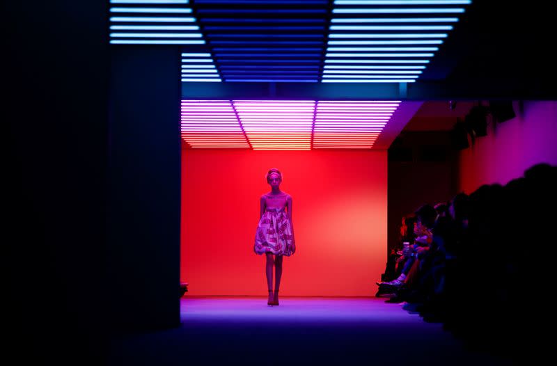 Model presents a creation during the Ashley Williams catwalk show at London Fashion Week in London