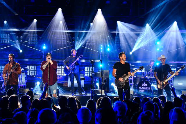 <p>Catherine Powell/Getty Images for CMT</p> HARDY and Nickelback performing on 'CMT Crossroads: Nickelback & HARDY'