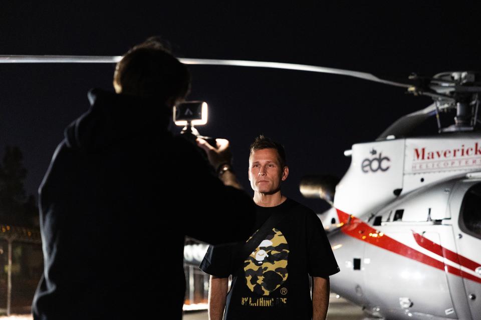 Ryan “Kaskade” Raddon poses for his videographer before a helicopter ride to the EDC music festival at the Las Vegas Motorway in Las Vegas on Saturday, May 20, 2023. | Ryan Sun, Deseret News