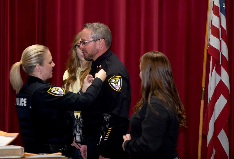Michael Yarian, a sergeant with the Alliance Police Department, was promoted to lieutenant Wednesday, Nov. 29, 2023, during a ceremony at Firehouse Theatre as his family looked on.